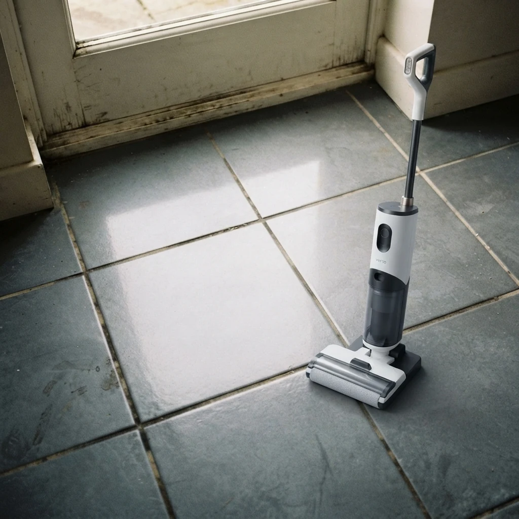 The same LVT after one pass of the Vekto Floor Washer F40, clean and drying, the dirty water in the clear tank